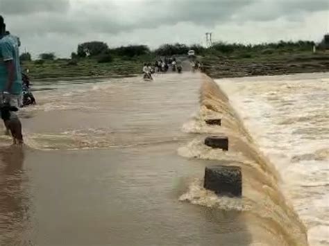 Due To Heavy Rains The Water Level In The River Increased The