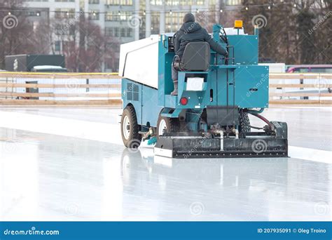 Ice Rink Cleaning Machine. Leveling the Surface of the Roller ...