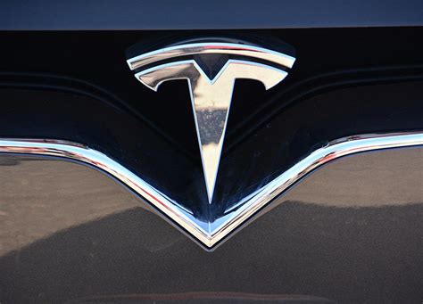 Tesla Model X Badge Photograph by Mike Martin - Pixels