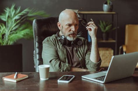 Shocked Mature Senior Man Captured Reading News On Laptop Man With