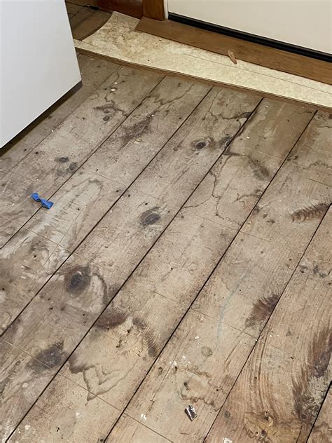 Car decking subfloor (1”x8”) and I need to install 3/4” HWF parallel to