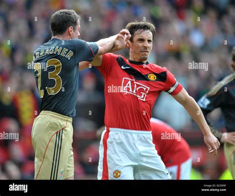 Liverpools Jamie Carragher Left And Manchester Uniteds Gary Neville Right Argue After