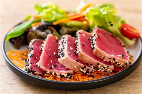 Premium Photo | Fresh tuna raw with vegetable salad