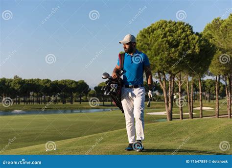 Golfer Walking And Carrying Bag Stock Image Image Of Middle Active