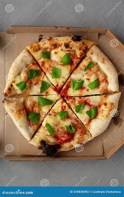 Organic Margarita Pizza With Basil And Mozarella In A Box Top View