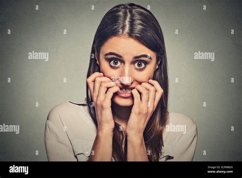 Closeup Portrait Young Unsure Hesitant Nervous Woman Biting Her