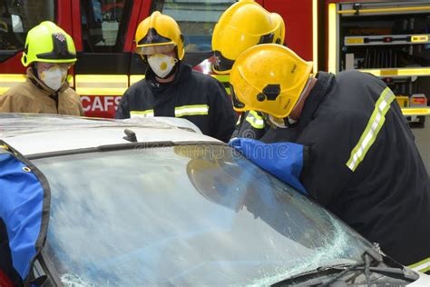 Firefighters At A Car Crash Editorial Image Image Of Equipment