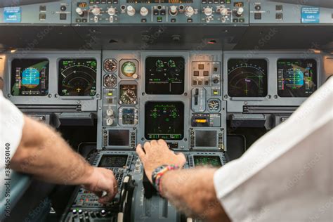 Cockpit view of an airplane in flight Stock Photo | Adobe Stock