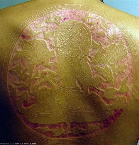 Scarification has to require a ridiculously high threshold for pain. : r/WTF