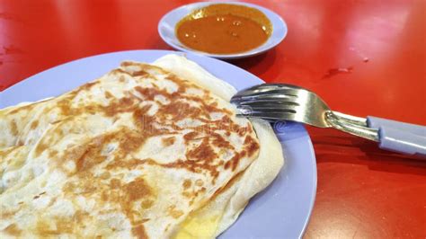 Roti Canai with Curry Sauce Stock Photo - Image of table, bread: 134762000