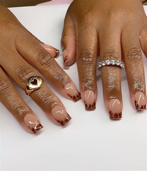 Aprés Gel X and Structured manicures on Instagram Snake print