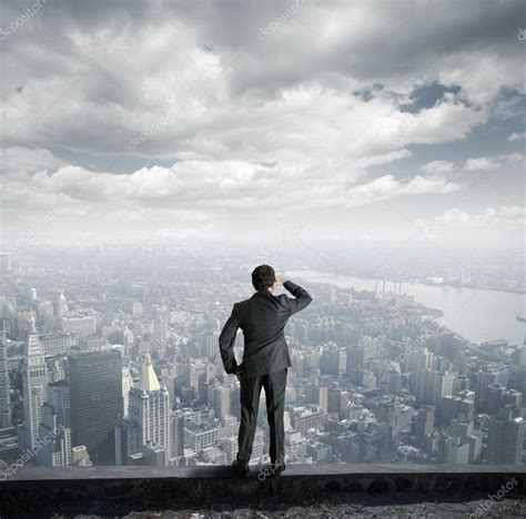 Businessman Looking To The Future Stock Photo By ©alphaspirit 12588045