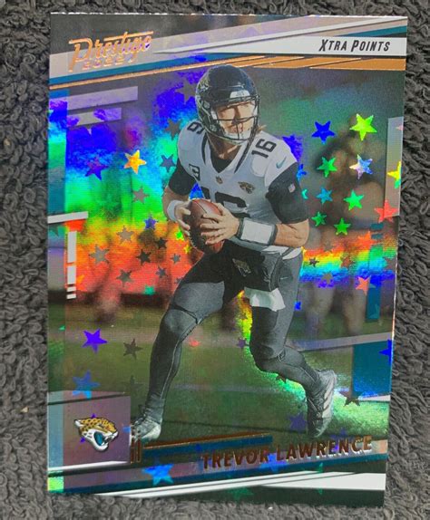 2022 Panini Prestige Trevor Lawrence Xtra Points Astral Parallel 132