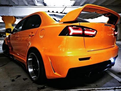 Orange Mitsubishi Lancer Cool Cars