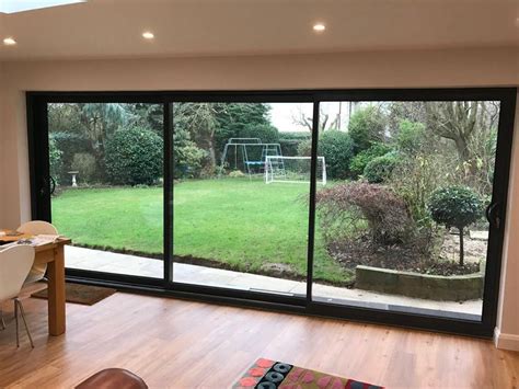 Smarts System Aluminium Triple Track Patio Door In Ral Anthracite