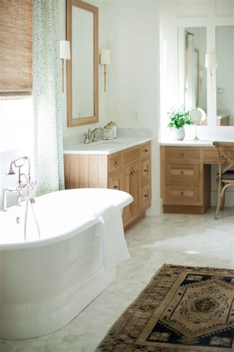 A Bathroom With A Rug Sink And Bathtub In It S Center Area