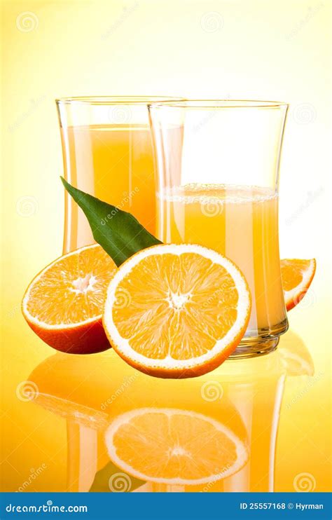 Two Glasses Of Fresh Orange Juice Half Oranges Stock Photo Image Of