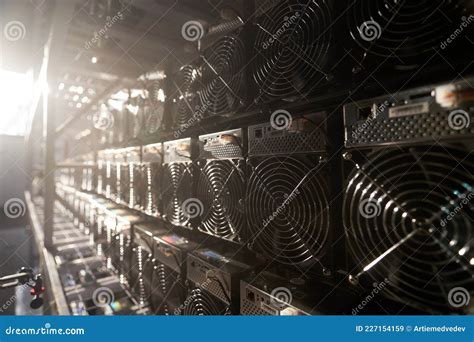 Bitcoin ASIC Miners In Warehouse ASIC Mining Equipment On Stand Racks