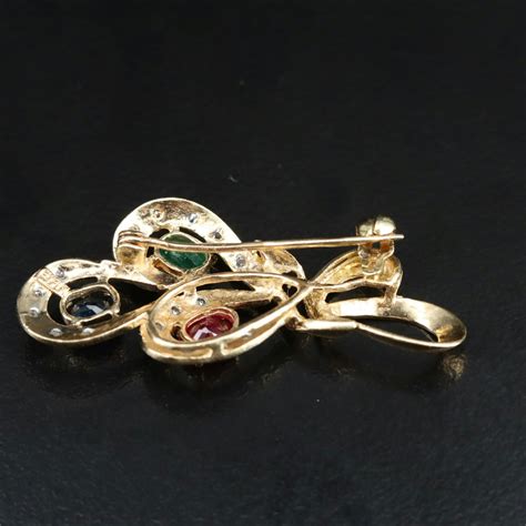 14k Multi Gemstone Brooch Including Emerald Sapphire And Ruby Ebth