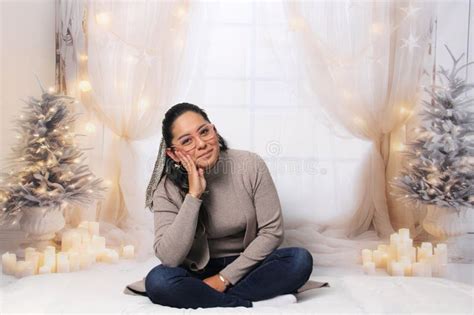 Year Old Latina Woman With Glasses And Santa Hat Next To The Decorated Tree Is Excited To