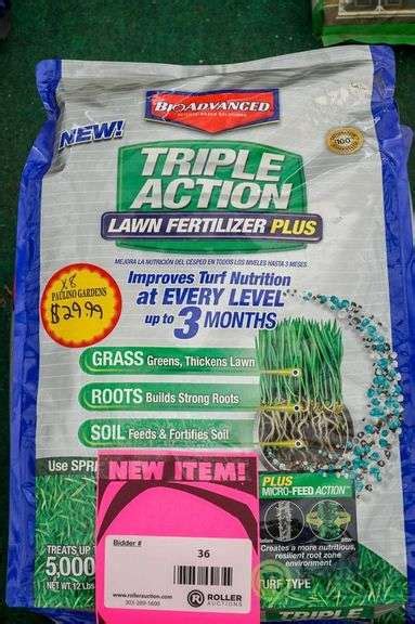 8 Bags Of BioAdvanced Tripple Action Lawn Fertilizer Plus Roller