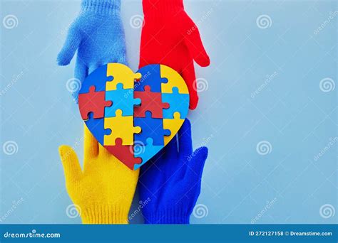 Hands Holding Jigsaw Puzzle Heart Shape Autism Awareness World Autism