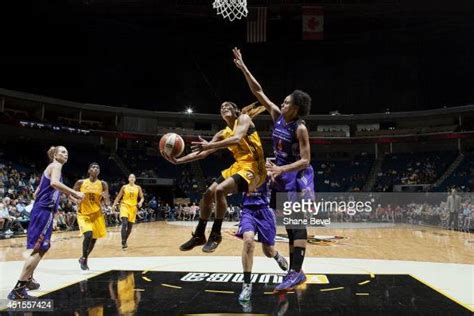 Skylar Diggins Of The Tulsa Shock Shoots Against Candice Dupree Of