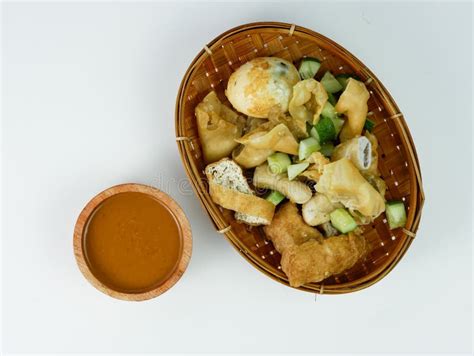 Batagor Or Fried Dumplings And Peanut Sauce Isolated On White