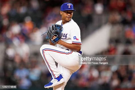 Jose Leclerc of the Texas Rangers delivers a pitch during a game ...