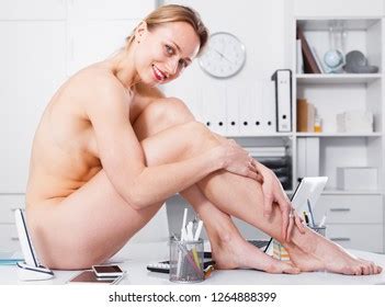 Cheerful Naked Girl Sitting On Table 스톡 사진 1264888399 Shutterstock