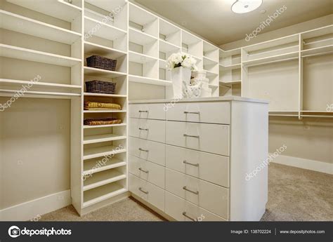 Huge Walk In Closet With Shelves Drawers And Shoe Racks Stock Photo