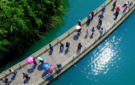 Amazing Dazzling Floating Walkway in the Middle of River in China - blogygold