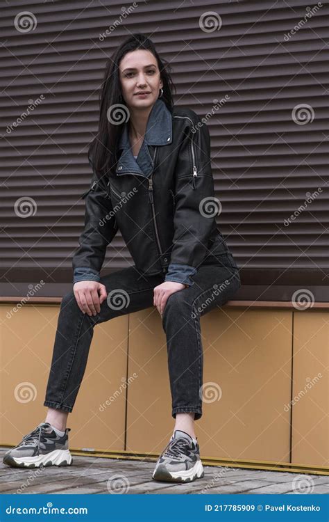 Portrait Of A Beautiful Brunette Girl Who Poses While Walking On The Street Stock Image Image