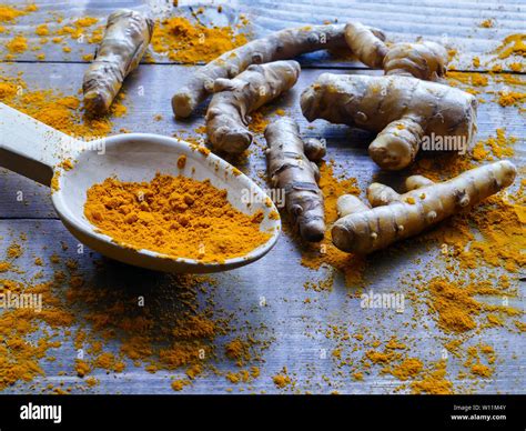 Turmeric Roots And Powder High Resolution Stock Photography And Images