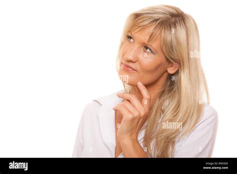 Thoughtful Thinking Mature Woman Looking Up Isolated On White