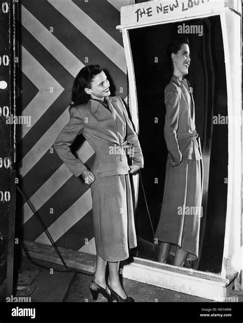 Geraldine Brooks At The Carnival Fun House Mirror 1948 Stock Photo