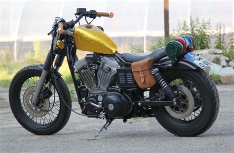 A Motorcycle Parked On Top Of A Parking Lot