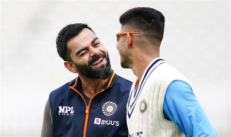 Virat Kohli and Shubman Gill share a light moment during India's ...