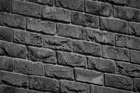 Abstract Black And White Background Made Of Orange Bricks Stock Image