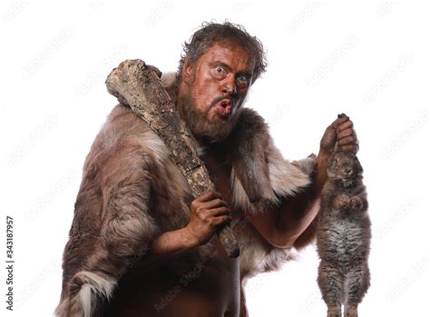 Neanderthal Man Ice Age Caveman With A Hare Stock Photo Adobe Stock