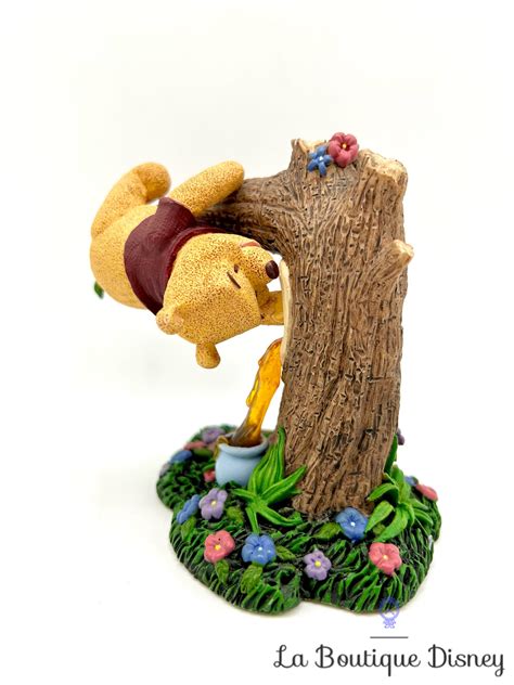 Figurine résine Winnie l ourson Stuck on you Simply Pooh Disney branche