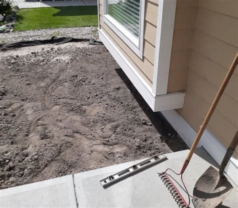 Is It Possible To Install Pavers Against The House Foundation