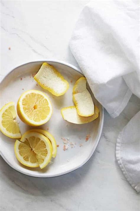 10 Inexpensive Ways to Clean with Lemon | Hello Glow