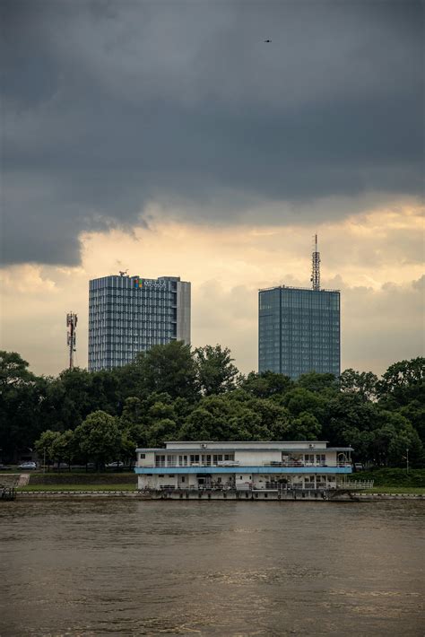 Rain Cloud over City with RiverFree Stock Photo