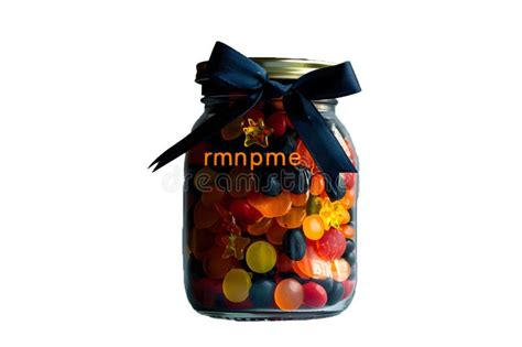 A Picture Of A Gratitude Jar Filled With Colorful Slips Of Paper With
