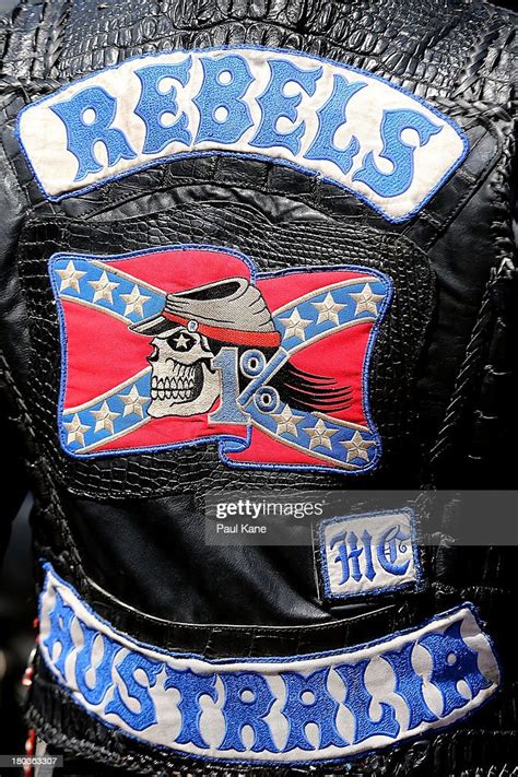 The Rebels Motorcycle Club Insignia Is Displayed On The Back Of A