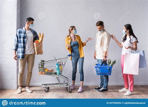 Four Multicultural People Waiting In Hall Stock Image Image Of Women