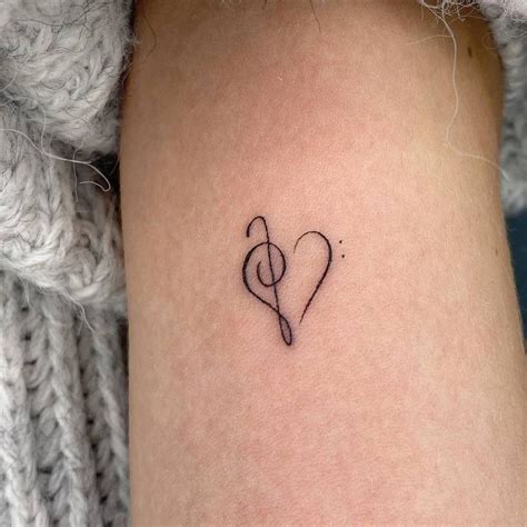 Bass And Treble Clef Heart Tattooed On The Inner Arm Small Music