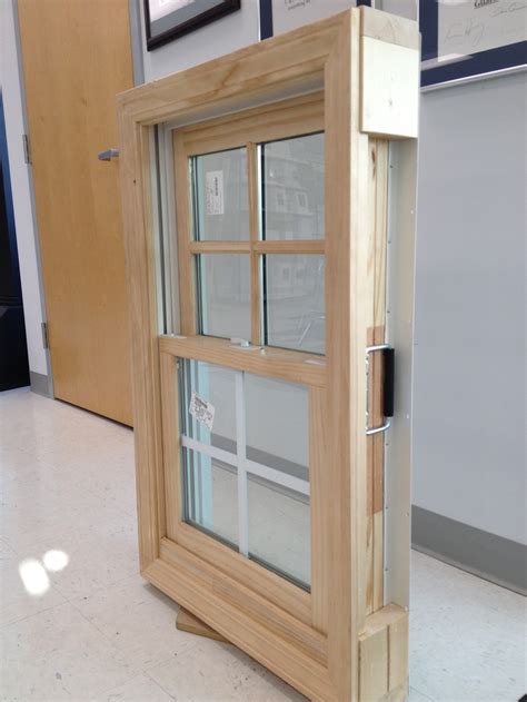 Ply Gem Wood Clad Double Hung Window With 78 Simulated Divided Lite Grids On Top Sash And 58