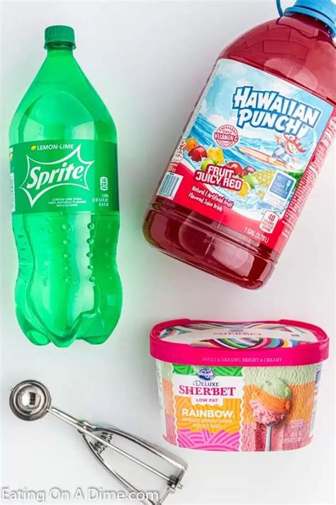 The Ingredients To Make Hawaiian Punch Are Displayed On A White Surface